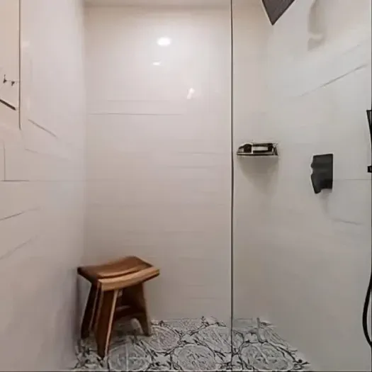 You'll feel pampered in the oversized shower of the split-king Master Suite, tucked privately at the back of the home. With separation from the other three bedrooms, it offers a quiet sanctuary for introverts who crave space to unwind and recharge.