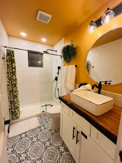 Hall way bathroom is shared by 3rd and 4th bedrooms. The other two bedrooms have their own bathroom inside their suite.