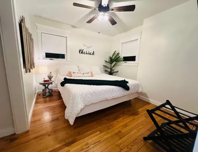 3rd king bedroom has a shared bathroom with one other bedroom in the hallway, next door. This room includes a 55-in tv on wall to the right, not pictured here.