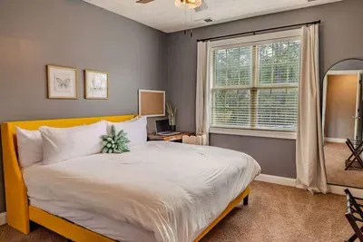 The second king bedroom has a desk and chair, large walk in closet, ceiling fan and a 55' TV (not pictured).