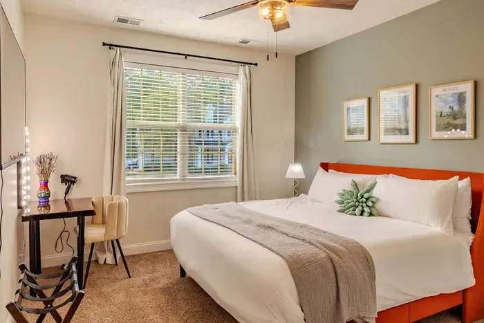 You'll love getting ready at this custom slab vanity and sleeping in the comfortable king bed.