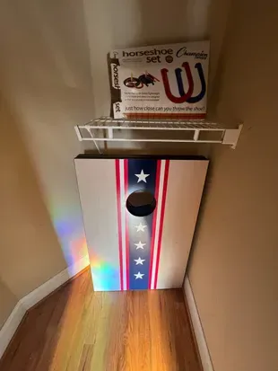 These outdoor games are located in Foyer Closet for guests to use.

More games are on the living room. There is also a selection of books. 
