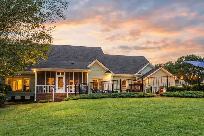 View of back of the house from Labrador Lake fire pit area.