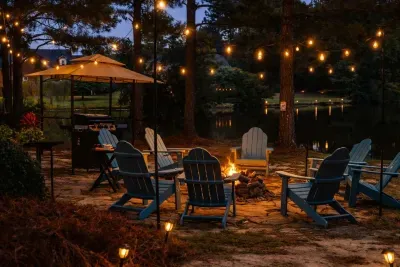Your lakeside grill and stone firepit is surrounded by 8 Adirondack chairs, perfect for evening gatherings. 

This is the second grill area. Primary grill area is by pool, next to house.