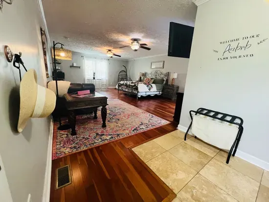 View from the patio door into the master bedroom suite, offering a quiet and secluded space to unwind as well as your private entrance. 