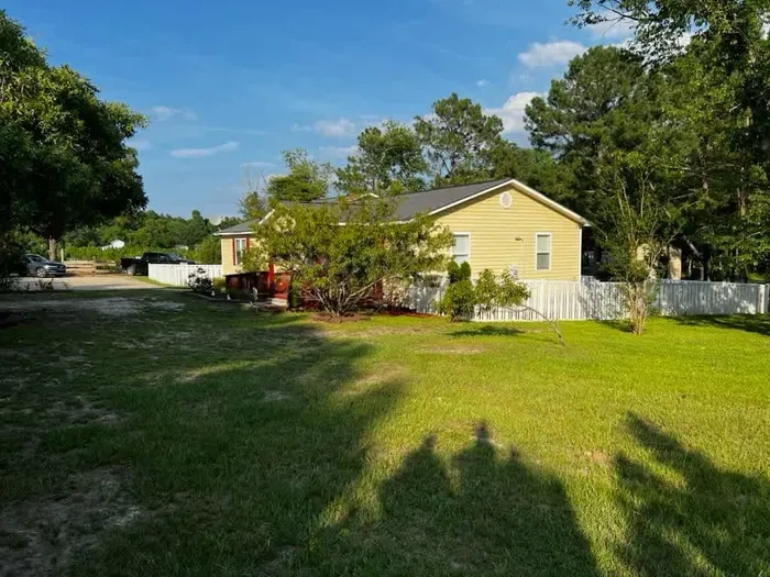 Front/partial right side of yard.