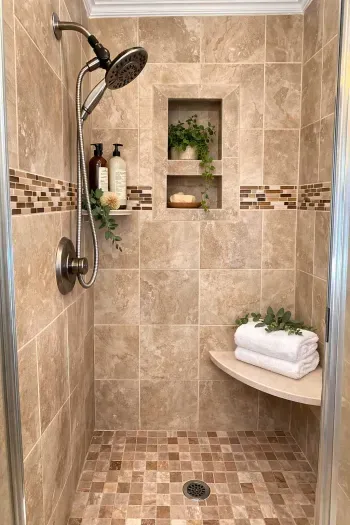 The master bathroom features a spacious tiled walk-in shower complete with a built-in bench. There is a separate oversized tub in bathroom as well.