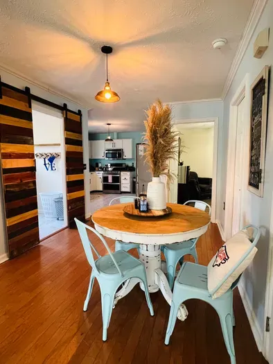 View of dining room and into the kitchen.
