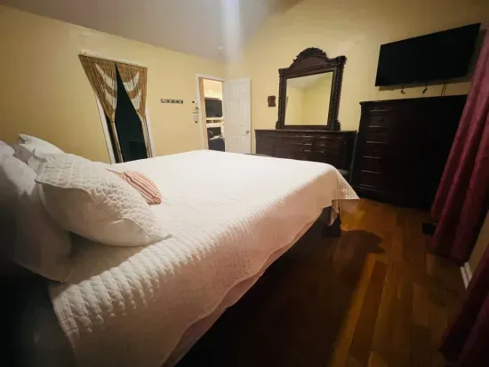 Master bedroom view from window corner. 