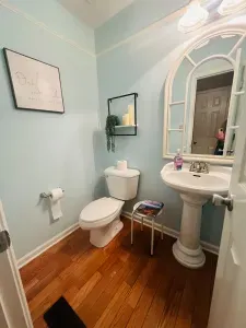 Downstairs 1/2 bathroom is by kitchen, dining room and living room.