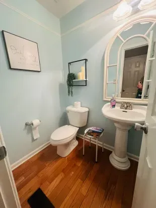 Downstairs 1/2 bathroom is by kitchen, dining room and living room.