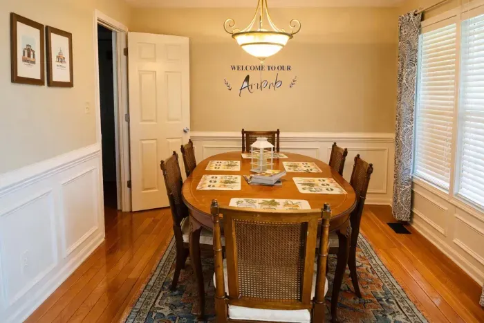 Dining room is to the right upon entering the house and has a second entrance from the hall  to kitchen.