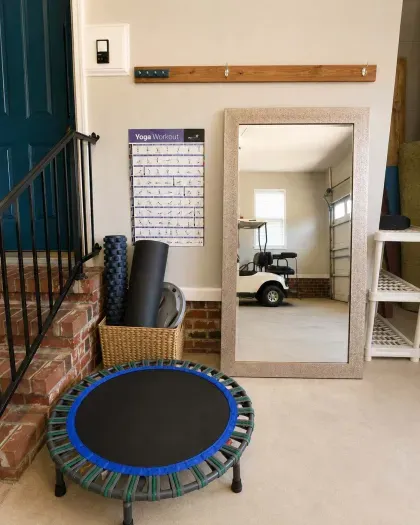 Yoga mat is in basket/ area.
