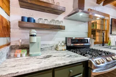 Kitchen amenities include keurig, Olive Oil, basic spices, keurig pods and tea.  