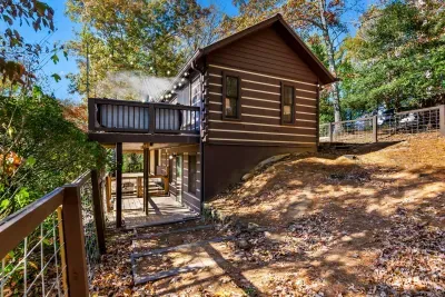 Walk down to the basement level to a media and game room! This room has a separate entrance from the main house.  