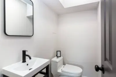 Half bath in the basement media room. 