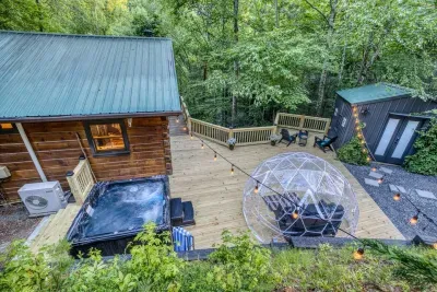 Everything you need-grill, fire pit, hot tub and dome in one spot!!!!