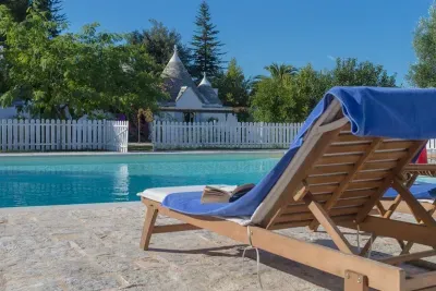 Looking at the Trullo from the 10 x 10 mt pool