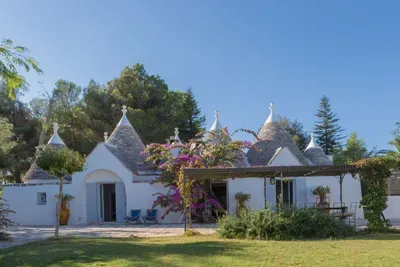 The Trullo has three large glazed doors to give it lots of light