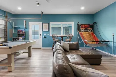 Another inviting hangout space where games, music, and relaxed conversations fill the room.