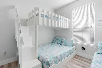 Kids usually claim this room first. Built in bunk beds make it feel fun and special, perfect for sleepovers, movie nights, and shared memories.