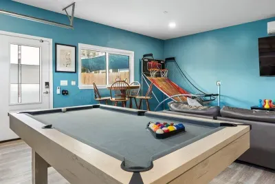 Another look at the game room where something is always happening, whether it’s a pool game, music playing, or people just relaxing on the couch.