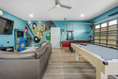 This arcade corner brings out everyone’s inner kid. Classic games, bright screens, and that nostalgic feeling of friendly competition late into the night.