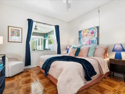 The second bedroom also has a comfy king bed and views to the pool!