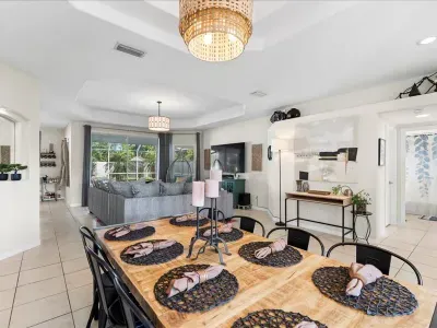 Open dining area with seating for the group, located next to the kitchen for easy meals and entertaining.