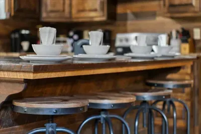 Bright open kitchen space with custom wood cabinetry and granite countertops.