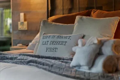 Soft linens and playful decor add a cozy and inviting touch to your restful retreat.