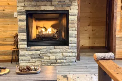 A beautiful fireplace that adds warmth and comfort, creating the perfect place to unwind during your stay