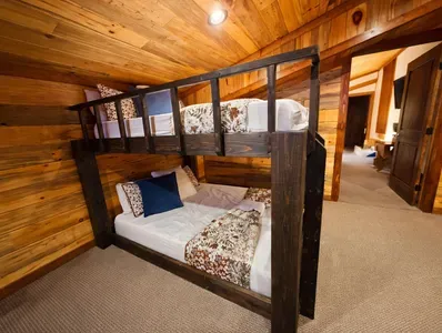 A larger bunk setup that works perfectly for families or groups, combining comfort with a fun shared space