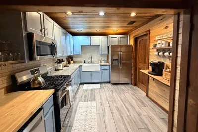 A spacious kitchen that makes cooking feel social and easy, with room for everyone to be part of the moment