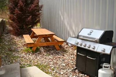 Fire up the grill and enjoy casual outdoor meals with a setup that makes cooking outside easy and enjoyable