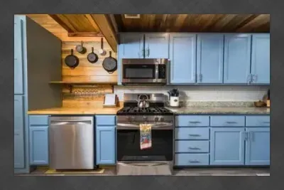 Another view of the kitchen where everything is set up for easy meals, whether you are cooking or just gathering around