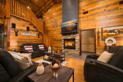 The living space feels warm and inviting, with wood interiors, comfortable seating, and a fireplace that brings everyone together