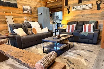 The living room is made for relaxing, with comfortable seating and a cozy layout that naturally brings everyone together