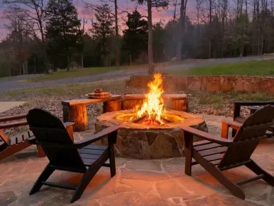 Evenings around the fire pit feel calm and connected, surrounded by nature and the quiet of this private escape