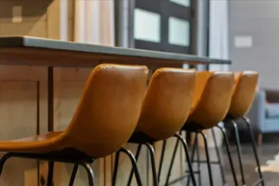 Kitchen bar seating with leather stools perfect for quick meals or conversation