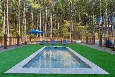Private Pool Oasis: Dive into refreshing fun surrounded by serene forest views!