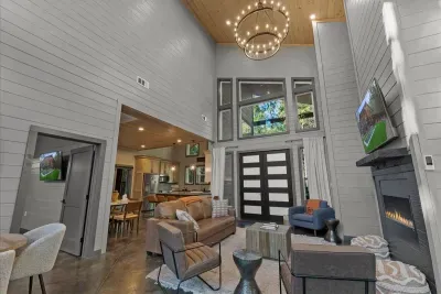 Open concept living space with high ceilings and modern cabin design