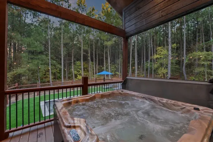 Covered upper deck with forest views ideal for quiet relaxation