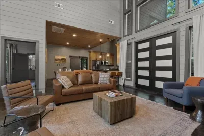 Settle into style and serenity in this spacious open-concept living room made for connection.