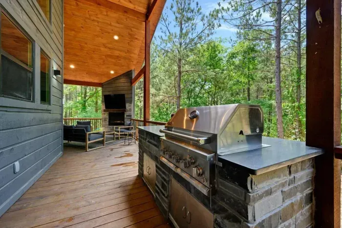 Outdoor Oasis: Sizzle under the stars with a grill and unwind by the fireplace surrounded by nature!