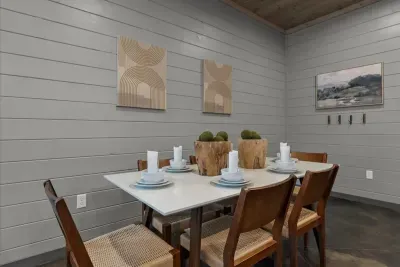 Dining Room: Elegant dining setup with natural wood accents and stylish modern decor, perfect for gatherings!