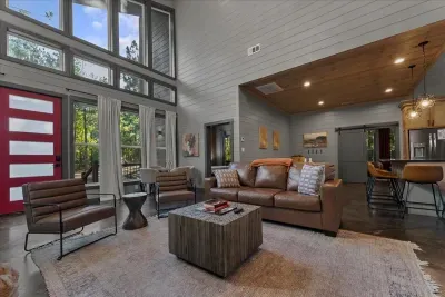 Living Room: Bright, airy space with high ceilings and stylish decor perfect for relaxation!