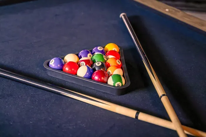 Enjoy a game of pool on the full-size pool table.