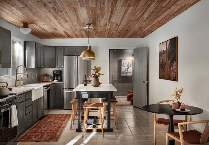 Enjoy cooking in our elegant and fully stocked kitchen, newly renovated with granite countertops, brass fixtures, a farmhouse sink, and brand-new stainless steel appliances.