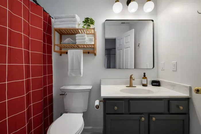 Private en-suite master bathroom with a walk-in shower, stylish finishes, and all the essentials ready for your stay.